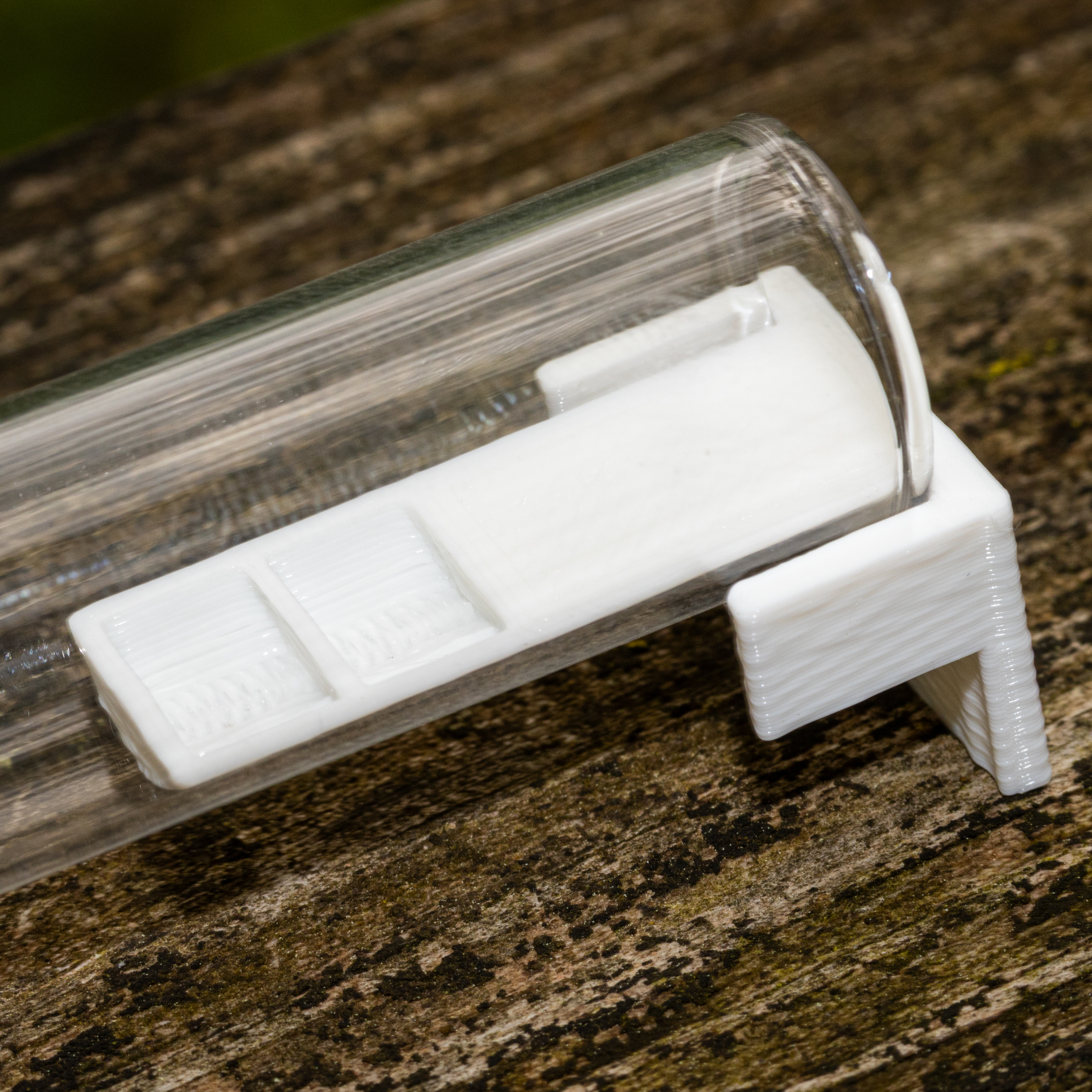 A test tube feeder in a test tube.